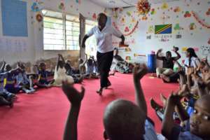 Children sing in a Play Lab.