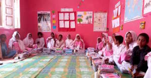 Students gather in a BRAC community-based school.