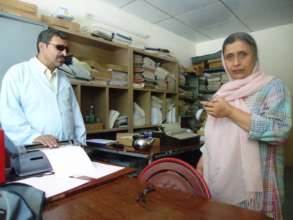 Parween Azimi discussing the trainign material