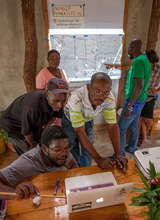 Romel Toussaint and the SOIL team in the office