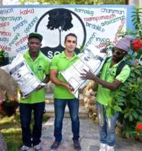 Port-au-Prince SOIL team shows off the new bags