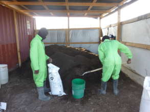 SOIL employees bagging our lush organic compost