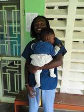 A Marymount Univ. intern comforts a young patient