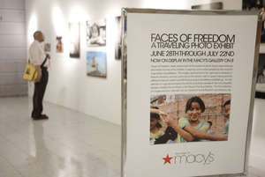 Faces of Freedom signage at Macy's