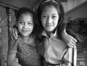 Sanju (right) with a friend at the rescue center