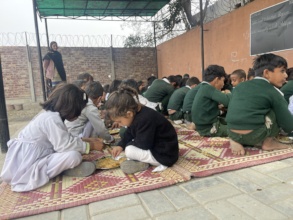 Students at NCOP Malikpur during their lunch break