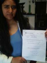 Angelica with her nursing school acceptance letter
