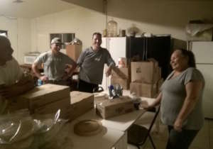Miguel (far left) telling us his testimony.