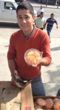 Pedro as a teen helping us distribute food