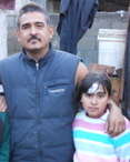 Angelica with her dad when she left the hospital