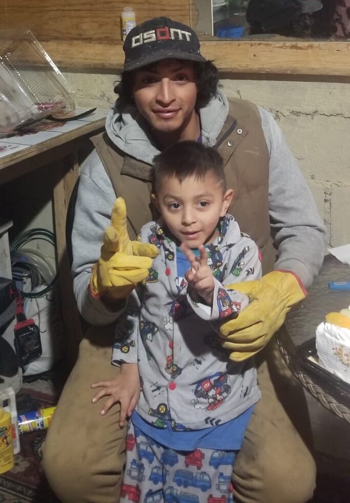 Manuel with his dad.