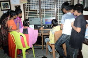 Orphan Children learning Computers skills