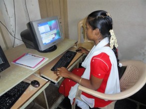 Poor family girl of orphanage learning computer