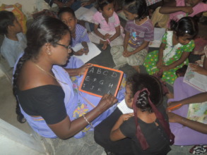 concentrating teacher on a particular child