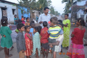 interacting with slum dwellers to send them school