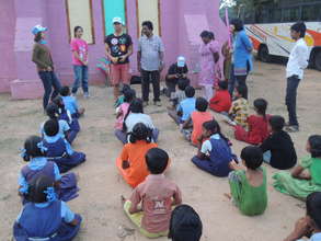 Volunteers explaining the importance of education