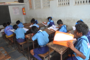 Students writing their notes