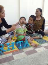 Thiyeu with our Yike teacher and two children