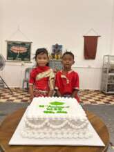 Two of our Students with our Cake!