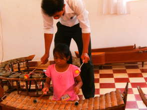 Pin peat teacher giving lesson KCDI.jpg