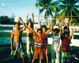 Vy N and his friends play football at our school