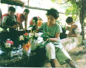 With his friends at school in the garden