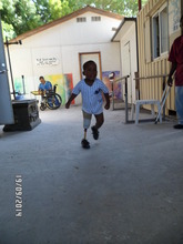 Little Jean Running with His New Prosthesis