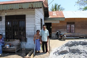 Neighbors in the village are rebuilding, too.