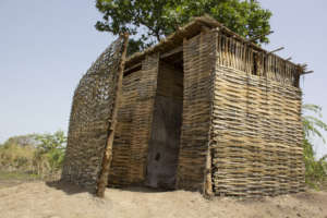 Angelo's new latrine will keep his family healthy.