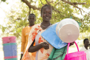 Woman receiving emergency supplies