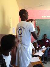 A Haitian young leader explains his drawing
