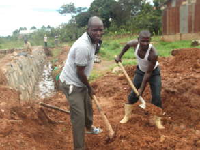 IYPA members cleaning the trenches.