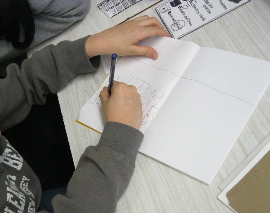 PS69 3rd grader sketching Family Storybook