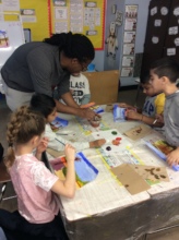 PS69 Teaching Artist helps student with landscape
