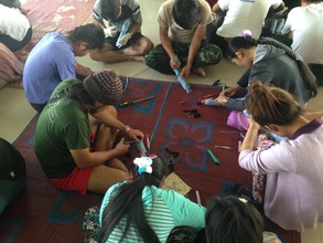 Medics pratice wound suturing