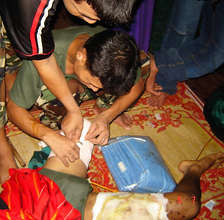 Medics providing emergency care in the field