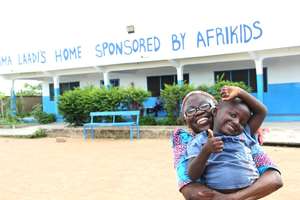 Mama Laadi with Jeremiah who came in 2010