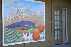 Leading the Way Outdoors sign