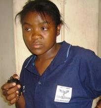 Mwiza Coaching her Basketball Girls team