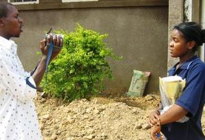 Mwiza having an interview with Muvi TV