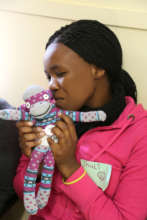 Thuli with her project Sock Monkey.