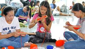 Girls knitting caps or scarves for Others