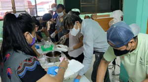 Staff, Volunteers,Young leaders help prepare lunch