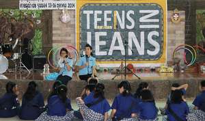 Boom talking with some campers in her care