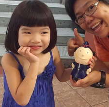 Little Hannah hands over the Girly Bank