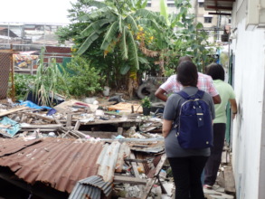 Path just outside Nur's home, with sinking ground