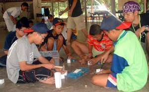 Members making toys for others