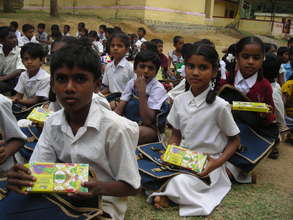 Children with new School Supplies