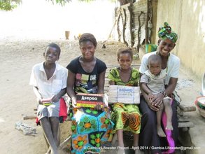 Jainaba and her family happy at receiving soap