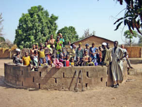 Sare Sambel villagers with their old pump in 2012